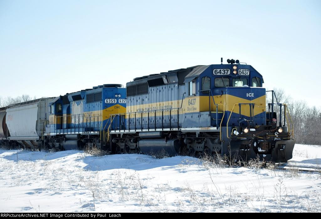 Local cruises west behind a pair of EMD's